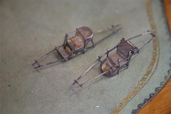 Two Chinese silver models of sedan chairs by Wang Hing, two Chinese wood figures, a pewter cup etc.